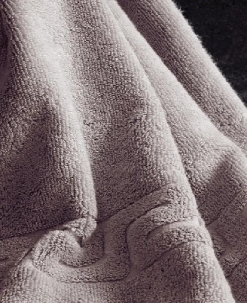 Махровое полотенце Dreamflor бежевого цвета от магазина Beddington.ru
