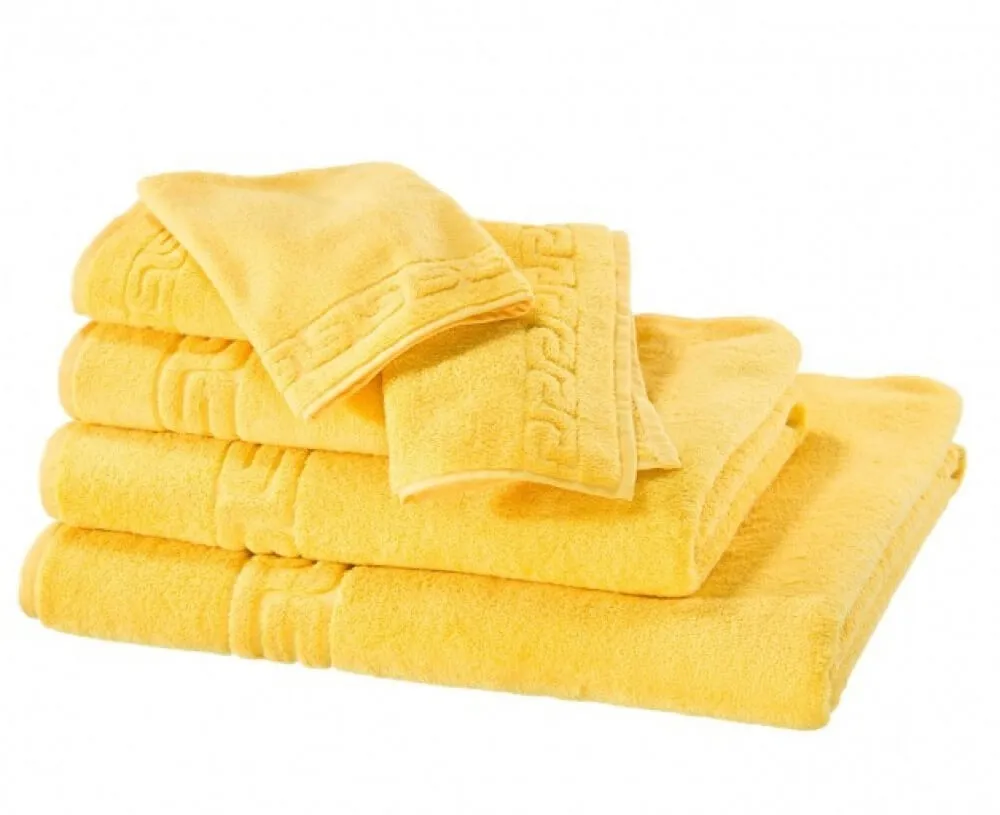 Махровое полотенце Dreamflor желтого цвета от магазина Beddington.ru
