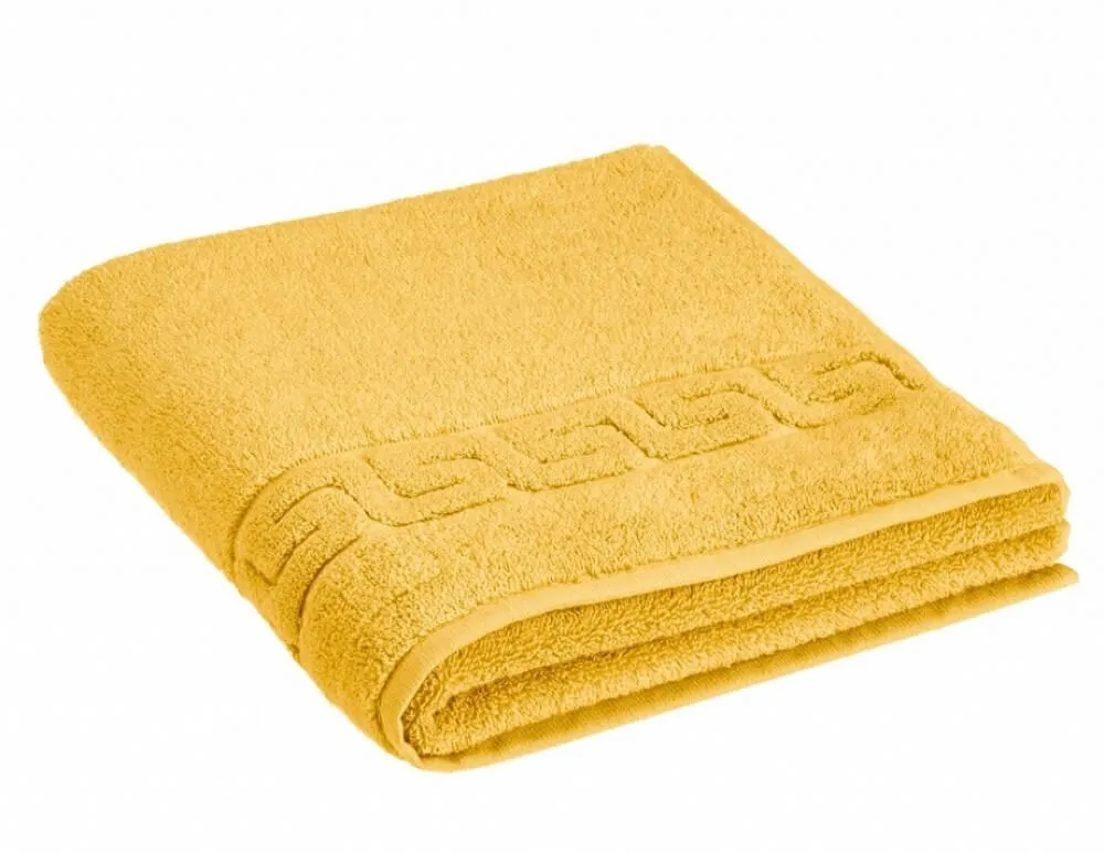 Махровое полотенце Dreamflor желтого цвета от магазина Beddington.ru